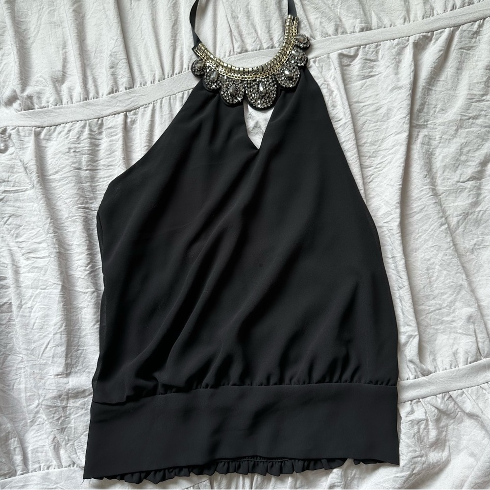 Halter style top with beaded design on neckline and scrunched elastic bottom